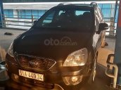 Bán Kia Carens SXMT đời 2012, màu đen, đã đi 65000 km