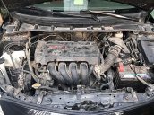 Bán xe Toyota Corolla Altis 1.8G sx 2009, số tay, máy xăng, màu đen, nội thất màu kem, đã đi 154000 km