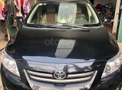 Bán xe Toyota Corolla Altis 1.8G sx 2009, số tay, máy xăng, màu đen, nội thất màu kem, đã đi 154000 km