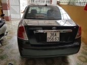 Cần bán Daewoo Lacetti Ex đời 2005, màu đen, xe gia đình sử dụng nên rất giữ xe