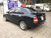 Cần bán Mazda 323 năm sản xuất 2004, màu đen, nhập khẩu nguyên chiếc, giá cạnh tranh