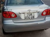 Cần bán lại xe Toyota Corolla altis sản xuất 2002, màu bạc xe gia đình