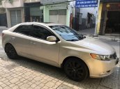 Cần bán Kia Forte 2013 tự động, màu vàng cát, Thaco ráp