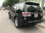 Bán Toyota Fortuner đời 2013 màu đen, giá 690 triệu