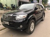 Bán Toyota Fortuner đời 2013 màu đen, giá 690 triệu