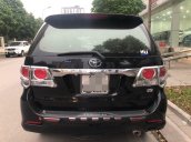 Bán Toyota Fortuner đời 2013 màu đen, giá 690 triệu