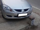 Cần bán xe Mitsubishi Lancer đời 2004, màu bạc, xe đi ít giữ gìn cẩn thận