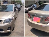 Bán Toyota Corolla altis đời 2010, màu vàng số sàn, giá tốt