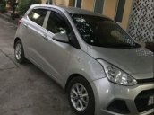 Cần bán lại xe Hyundai Grand i10 đời 2014, màu bạc, nhập khẩu xe gia đình