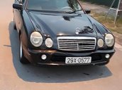 Cần bán gấp Mercedes E230 AT đời 1996, màu đen, xe nhập như mới 