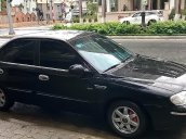 Bán Kia Spectra 1.6 MT đời 2005, màu đen, nhập khẩu nguyên chiếc