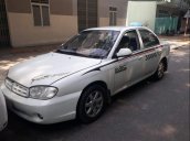 Cần bán gấp Kia Spectra năm sản xuất 2004, màu trắng, giá 105tr