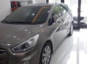 Cần bán Hyundai Accent 1.4 AT sản xuất 2014, màu nâu, xe nhập