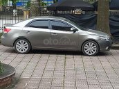 Bán xe Kia Cerato 1.6 AT 2010, màu xám, xe nhập