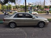 Cần bán xe Ford Laser sản xuất 2003, màu kem (be), 220 triệu