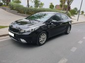 Cần bán gấp Kia Cerato 1.6 MT đời 2017, màu đen như mới