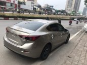 Bán ô tô Mazda 3 1.5 AT năm sản xuất 2016, màu vàng