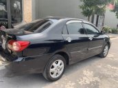 Cần bán xe Toyota Corolla altis năm 2004, màu đen, giá chỉ 255 triệu