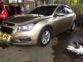 Cần bán xe Chevrolet Cruze đời 2016, màu vàng còn mới