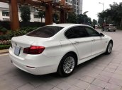 Chính chủ bán xe BMW 5 Series 520i đời 2015, màu trắng/kem, nhập khẩu, có cửa hít