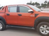 Bán Toyota Hilux 2.8G AT máy dầu, màu cam, nhập khẩu nguyên chiếc