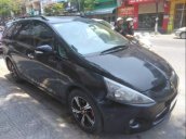 Cần bán Mitsubishi Grandis năm sản xuất 2015, màu đen, xe nhập xe gia đình