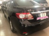 Cần bán Toyota Altis 1.8G số sàn màu đen, năm sản xuất 2012, tình trạng xe còn rất tốt