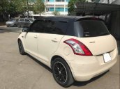 Bán gấp Suzuki Swift 1.4AT đời 2015, màu kem (be), nhập khẩu xe gia đình