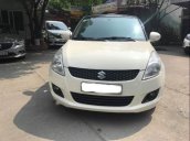 Bán gấp Suzuki Swift 1.4AT đời 2015, màu kem (be), nhập khẩu xe gia đình