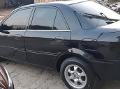 Bán Mazda 323 đời 2004, màu đen, xe nhập 