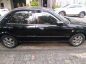 Bán Ford Laser đời 2003, màu đen, xe nhập