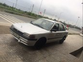 Bán lại xe Mazda 323 đời 1995, màu trắng, nhập khẩu nguyên chiếc