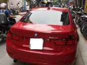 Cần bán xe BMW 320i sản xuất 2012 màu đỏ