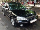 Bán xe Ford Laser Ghi 1.8 2011, màu đen, xe gia đình 
