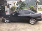 Cần bán Mazda 323 đời 2001, màu đen, xe nhập, 78tr