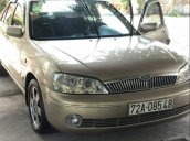 Bán xe Ford Laser sản xuất năm 2003, màu vàng, giá tốt