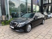 Bán xe Mercedes E200 màu đen, nội thất kem 2015 cũ chính hãng. Trả trước 480 triệu nhận xe