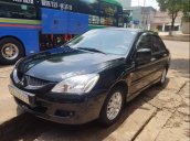 Cần bán gấp Mitsubishi Lancer GLX 1.6 AT năm sản xuất 2003, màu đen chính chủ  