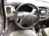 Bán lại xe Toyota Innova 2.0E năm 2014, màu bạc số sàn