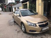 Bán xe Chevrolet Cruze LS sản xuất 2010, màu vàng số sàn