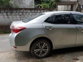Cần bán Toyota Corolla Altis 1.8G đời 2015, màu bạc  