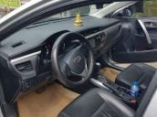 Cần bán Toyota Corolla Altis 1.8G đời 2015, màu bạc  