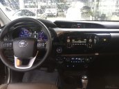 Bán gấp Toyota Hilux 3.0G 4x4 AT đời 2016, màu bạc, xe nhập