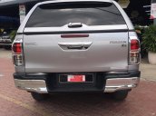 Bán gấp Toyota Hilux 3.0G 4x4 AT đời 2016, màu bạc, xe nhập