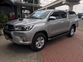 Bán gấp Toyota Hilux 3.0G 4x4 AT đời 2016, màu bạc, xe nhập