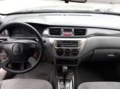 Bán xe Mitsubishi Lancer năm 2003, màu vàng, nhập khẩu 