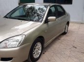 Bán xe Mitsubishi Lancer năm 2003, màu vàng, nhập khẩu 