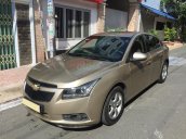 Bán Chevrolet Cruze LS 2011 số sàn ,màu vàng cát, gia đình chính chủ