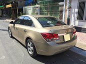 Bán Chevrolet Cruze LS 2011 số sàn ,màu vàng cát, gia đình chính chủ