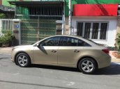 Bán Chevrolet Cruze LS 2011 số sàn ,màu vàng cát, gia đình chính chủ